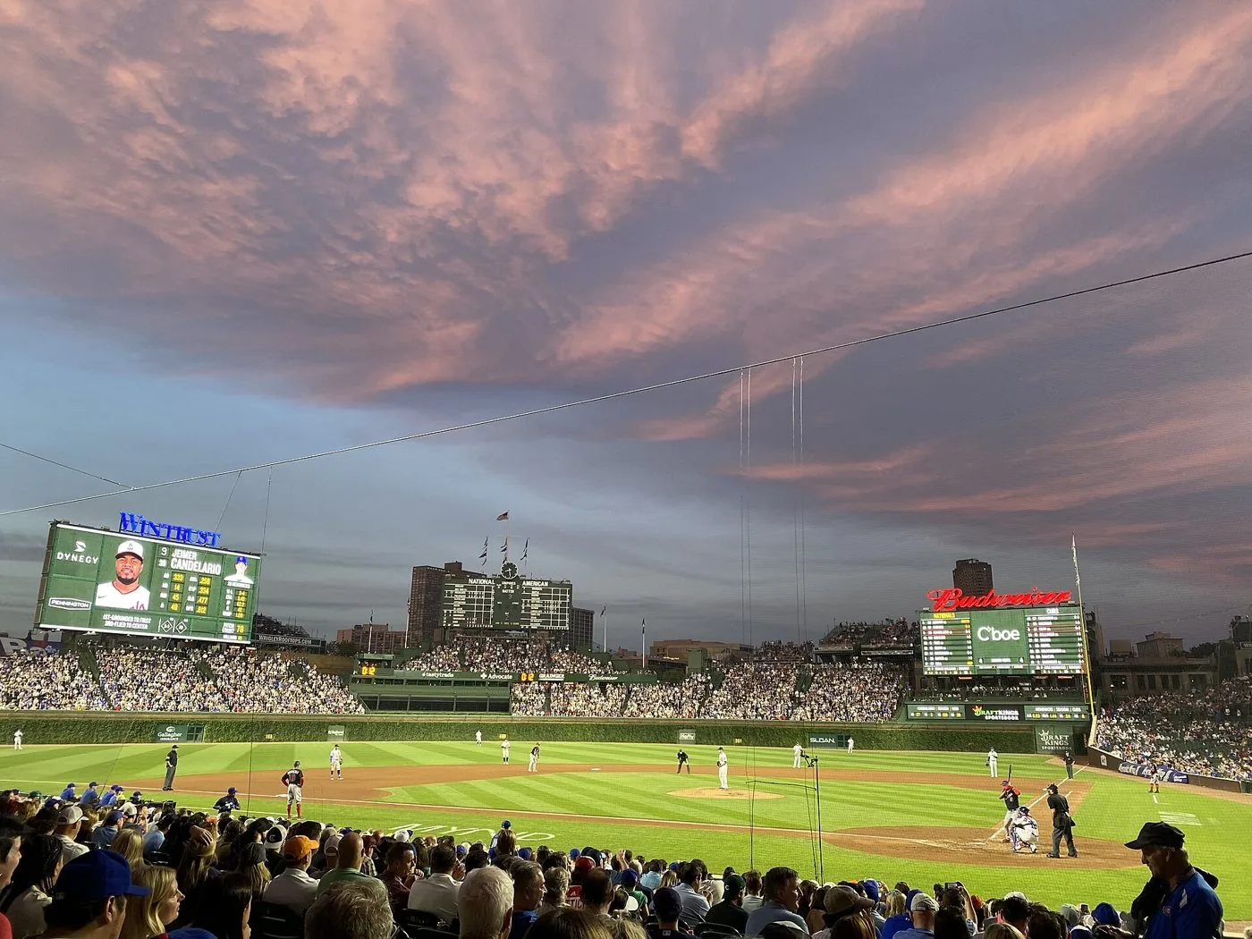 Sunset over Wrigley Field in Chicago, the ballpark hosting the Reds and Cubs under 9.5 on tonight's card